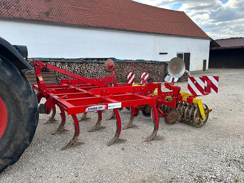 Pöttinger Synkro 3003 Grubber 3m Schneidringwalze Flügelschar